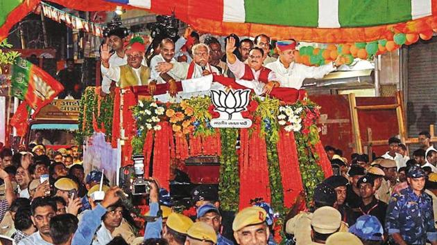 BJP working president J P Nadda, Chief minister Manohar Lal Khattar, party general secretary Anil Jain seen during the Jan Aashirwad Yatra, at Sadar Bazar, in Gurugram. (Photo by Yogendra Kumar/Hindustan Times) BJP working president J P Nadda, Chief minister Manohar Lal Khattar, party general secretary Anil Jain seen during the Jan Aashirwad Yatra, at Sadar Bazar, in Gurugram. (Photo by Yogendra Kumar/Hindustan Times)