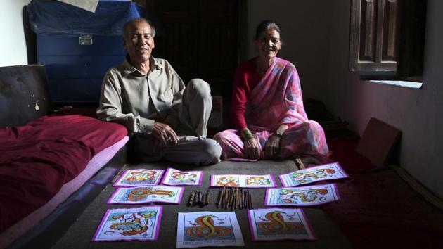 Chitrakar couple Tej Kumari and Purna pose for a photograph at their residence in Bhaktapur surrounded by their work and its tools. “It is a craft I have known and practiced for ages,” Tej said. “If anyone in Nepal would like to learn it and keep the culture alive, I would happily teach them.” (Niranjan Shrestha / AP) Chitrakar couple Tej Kumari and Purna pose for a photograph at their residence in Bhaktapur surrounded by their work and its tools. “It is a craft I have known and practiced for ages,” Tej said. “If anyone in Nepal would like to learn it and keep the culture alive, I would happily teach them.” (Niranjan Shrestha / AP)