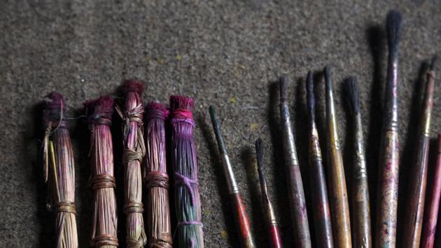 Handmade traditional brushes are lined up along with modern ones at the residence of Chitrakar couple Tej Kumari and Purna, in Bhaktapur, Nepal. Chitrakar families in Kathmandu were renowned traditional painters and sculptors who depicted gods and goddesses on temples, masks of Hindu deities and posters for various religious celebrations. For the Chitrakar couple it is a struggle to keep the art alive against modern mass produced prints. (Niranjan Shrestha / AP) Handmade traditional brushes are lined up along with modern ones at the residence of Chitrakar couple Tej Kumari and Purna, in Bhaktapur, Nepal. Chitrakar families in Kathmandu were renowned traditional painters and sculptors who depicted gods and goddesses on temples, masks of Hindu deities and posters for various religious celebrations. For the Chitrakar couple it is a struggle to keep the art alive against modern mass produced prints. (Niranjan Shrestha / AP)