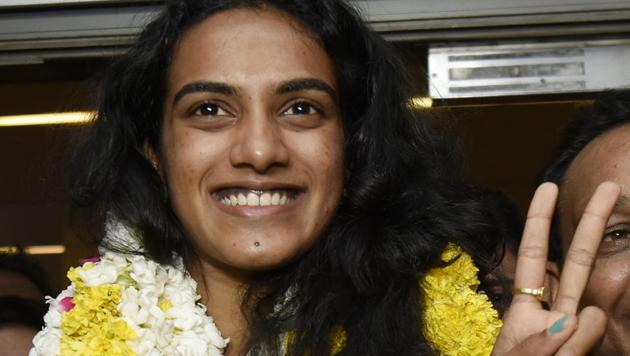 File image of PV Sindhu arriving in New Delhi after winning gold at BWF World Championships.(Vipin Kumar/HT PHOTO)