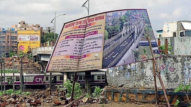 The MSRDC hoarding on Kalyan-Shilphata stretch details how the Patripool will look.(Rishikesh Choudhary/HT Photo) The MSRDC hoarding on Kalyan-Shilphata stretch details how the Patripool will look.(Rishikesh Choudhary/HT Photo)