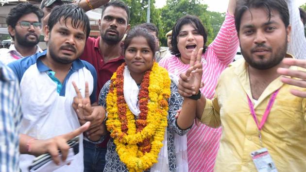 NSUI rebel with supporters celebrate the victory as PResident of RUSU, at rajasthan university in Jaipur (HT file)