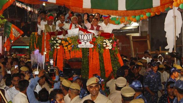 BJP working president J P Nadda, Chief minister Manohar Lal Khattar, party general secretary Anil Jain seen during the Jan Aashirwad Yatra at Sadar Bazar in Gurugram. (Yogendra Kumar/HT PHOTO) BJP working president J P Nadda, Chief minister Manohar Lal Khattar, party general secretary Anil Jain seen during the Jan Aashirwad Yatra at Sadar Bazar in Gurugram. (Yogendra Kumar/HT PHOTO)
