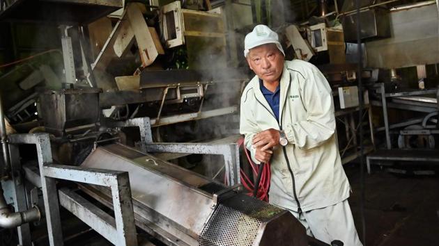 A man working at a Japanese tea factory in Fujieda. Now, sencha accounts for half of 80,242 tonnes of green tea produced annually in Japan, compared to 3.3% for matcha tea leaves -- although production of the latter is growing. Japanese traditionally drink green tea with rice but are doing so less as the diet becomes less dependent on the grain. (Charly Triballeau / AFP) 
