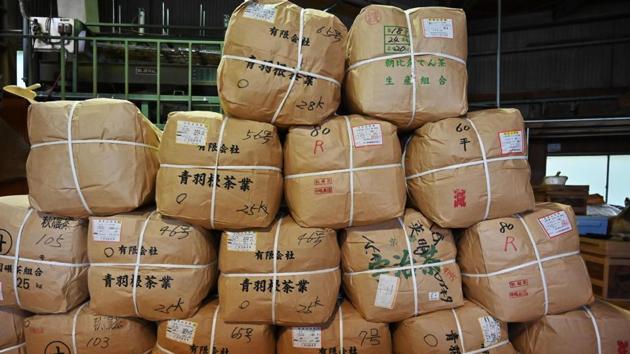 Bags of dried Japanese green tea leaves at a tea factory in Fujieda. In 1998, Suzuki’s company Marushichi Seicha started making powdered matcha green tea -- traditionally made using a bamboo whisk in a tiny room. The firm now exports 30 tonnes of green tea to the US, Europe, Africa, Asia and the Middle East. (Charly Triballeau / AFP) 