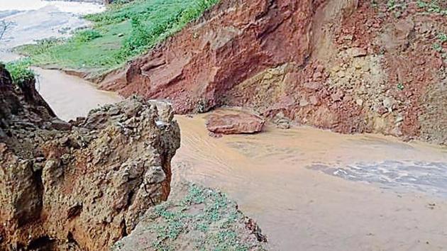 Over 50 metres of the canal bank was washed away due to heavy pressure, after water was released in the canal after the inauguration.(HT Photo)