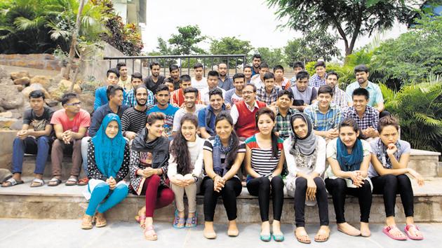Students from Kashmir studying at Sarhad, Pune, with founder-president Sanjay Nahar (red sweater).(HT PHOTO) Students from Kashmir studying at Sarhad, Pune, with founder-president Sanjay Nahar (red sweater).(HT PHOTO)