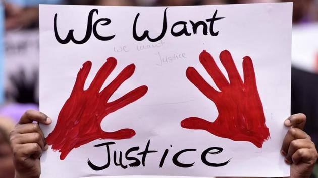 The victim was taken to the police station where she narrated her ordeal and a lodged a case against 50-60 unidentified people. (HT Photo (Representational image)) The victim was taken to the police station where she narrated her ordeal and a lodged a case against 50-60 unidentified people. (HT Photo (Representational image))