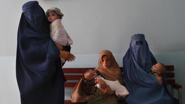 Mothers along with malnutritioned babies at a UNICEF clinic in Jabal Saraj, Afghanistan. Much depends on the Taliban, who have indicated they want that aid to continue even as they call for armed “invaders” to leave. But if the insurgent group that already controls roughly half of Afghanistan tries to assert a harsh form of Islamic law across the country or continues its attacks, some donors could walk away. (Rafiq Maqbool / AP) Mothers along with malnutritioned babies at a UNICEF clinic in Jabal Saraj, Afghanistan. Much depends on the Taliban, who have indicated they want that aid to continue even as they call for armed “invaders” to leave. But if the insurgent group that already controls roughly half of Afghanistan tries to assert a harsh form of Islamic law across the country or continues its attacks, some donors could walk away. (Rafiq Maqbool / AP)