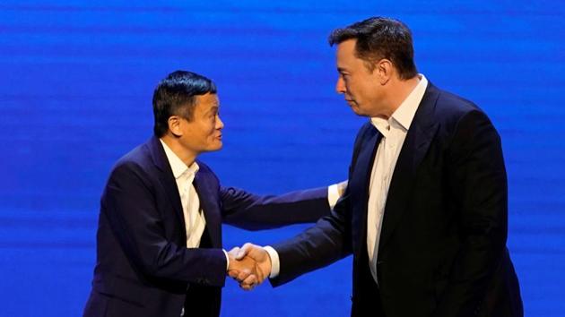Tesla Inc CEO Elon Musk and Alibaba Group Holding Ltd Executive Chairman Jack Ma shake hands at the World Artificial Intelligence Conference (WAIC) in Shanghai, China. (Reuters Photo) Tesla Inc CEO Elon Musk and Alibaba Group Holding Ltd Executive Chairman Jack Ma shake hands at the World Artificial Intelligence Conference (WAIC) in Shanghai, China. (Reuters Photo)