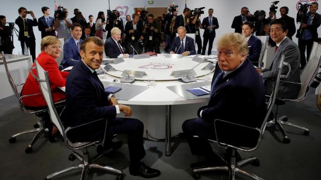 French President Emmanuel Macron, US President Donald Trump, Japan’s Prime Minister Shinzo Abe, Britain’s Prime Minister Boris Johnson, German Chancellor Angela Merkel , Canada’s Prime Minister Justin Trudeau, Italy’s acting Prime Minister Giuseppe Conte and European Council President Donald Tusk attend a G7 working session on “International Economy and Trade, and International Security Agenda” in Biarritz, France. (Philippe Wojazer / Pool / REUTERS) French President Emmanuel Macron, US President Donald Trump, Japan’s Prime Minister Shinzo Abe, Britain’s Prime Minister Boris Johnson, German Chancellor Angela Merkel , Canada’s Prime Minister Justin Trudeau, Italy’s acting Prime Minister Giuseppe Conte and European Council President Donald Tusk attend a G7 working session on “International Economy and Trade, and International Security Agenda” in Biarritz, France. (Philippe Wojazer / Pool / REUTERS)