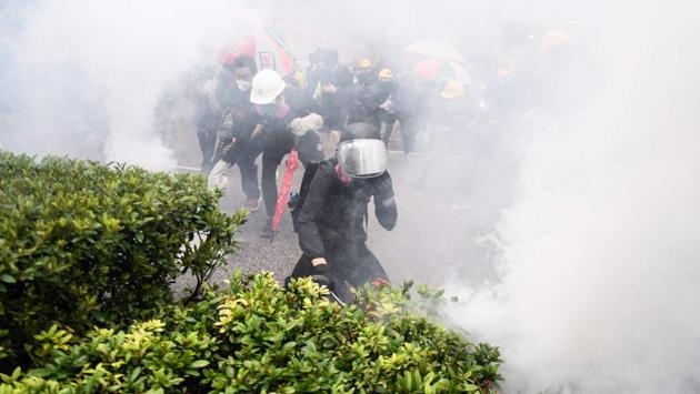 “I’m one of the people who advocate democracy... if the bill is passed I may be extradited to China,” Nick said. While both are confident they are doing the right thing, the abnormality of life after three months of protest is starting to catch up with them. “We’re exhausted... fighting police, taking rubber bullets, it shouldn’t be like this,” he said. (Anthony Wallace / AFP) “I’m one of the people who advocate democracy... if the bill is passed I may be extradited to China,” Nick said. While both are confident they are doing the right thing, the abnormality of life after three months of protest is starting to catch up with them. “We’re exhausted... fighting police, taking rubber bullets, it shouldn’t be like this,” he said. (Anthony Wallace / AFP)