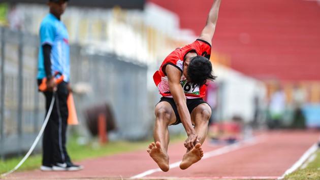 A shoeless student competes in the men’s long jump competition during Indonesian High School Olympic (O2SN) in Banda Aceh, Indonesia. (Chaideer Mahyuddin / AFP) A shoeless student competes in the men’s long jump competition during Indonesian High School Olympic (O2SN) in Banda Aceh, Indonesia. (Chaideer Mahyuddin / AFP)