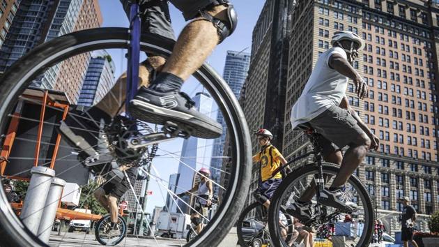 Unicyclist gather near Battery Park for a ride up the West Side to kick-off the Labor Day weekend Unicycle Festival, in New York. (Bebeto Matthews / AP) Unicyclist gather near Battery Park for a ride up the West Side to kick-off the Labor Day weekend Unicycle Festival, in New York. (Bebeto Matthews / AP)