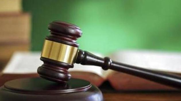 The high court took suo motu cognisance of the photograph which appeared in newspapers with cops posing with the mother. (iStockphoto) The high court took suo motu cognisance of the photograph which appeared in newspapers with cops posing with the mother. (iStockphoto)