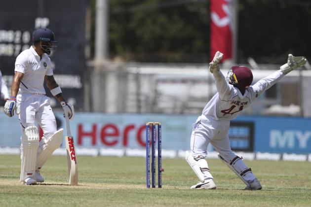 Kingston: West Indies' wicket keeper Jahmar Hamilton unsuccessfully appeals for the wicket of India's captain Virat Kohli during day one of the second Test. (AP) Kingston: West Indies' wicket keeper Jahmar Hamilton unsuccessfully appeals for the wicket of India's captain Virat Kohli during day one of the second Test. (AP)