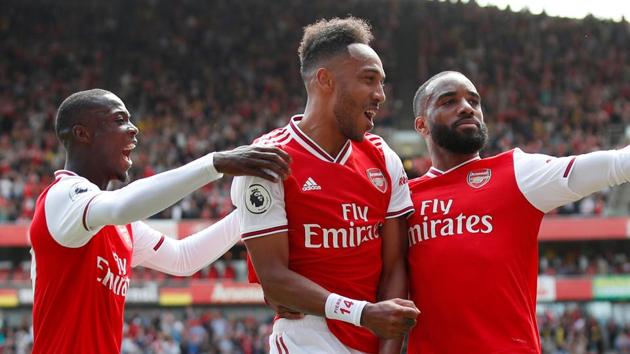 Arsenal's Pierre-Emerick Aubameyang celebrates with teammates after scoring a goal. (REUTERS) Arsenal's Pierre-Emerick Aubameyang celebrates with teammates after scoring a goal. (REUTERS)