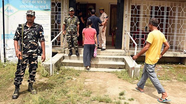 Security personnel stand guard outside the National Register of Citizens (NRC) Seva Kendra while people arrive to check their names on the final list in Guwahati. Security had been beefed up and 218 companies of central paramilitary forces deployed to maintain peace. There was no report of any untoward incident immediately after the final list was made public at 10 am. (ANI) Security personnel stand guard outside the National Register of Citizens (NRC) Seva Kendra while people arrive to check their names on the final list in Guwahati. Security had been beefed up and 218 companies of central paramilitary forces deployed to maintain peace. There was no report of any untoward incident immediately after the final list was made public at 10 am. (ANI)