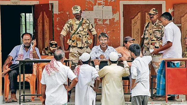 People check their names on the final list of the National Register of Citizens in Kamrup on Saturday. (PTI Photo) People check their names on the final list of the National Register of Citizens in Kamrup on Saturday. (PTI Photo)