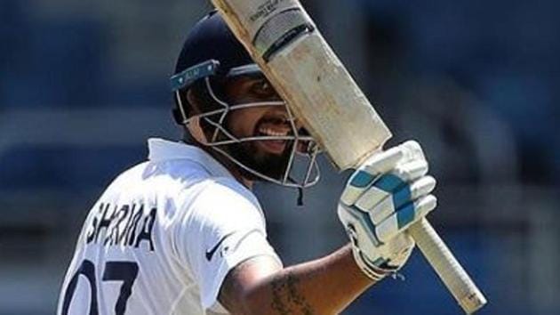 Ishant Sharma raises his bat after completing his half-century.(BCCI/ Instragram)