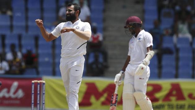 India's Mohammed Shami celebrates taking a wicket in the first Test match against West Indies.(AP)