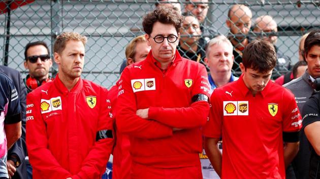Ferrari's Sebastian Vettel, Ferrari team principal Mattia Binotto and Ferrari's Charles Leclerc during a minutes silence in memory of Anthoine Hubert . (REUTERS) Ferrari's Sebastian Vettel, Ferrari team principal Mattia Binotto and Ferrari's Charles Leclerc during a minutes silence in memory of Anthoine Hubert . (REUTERS)