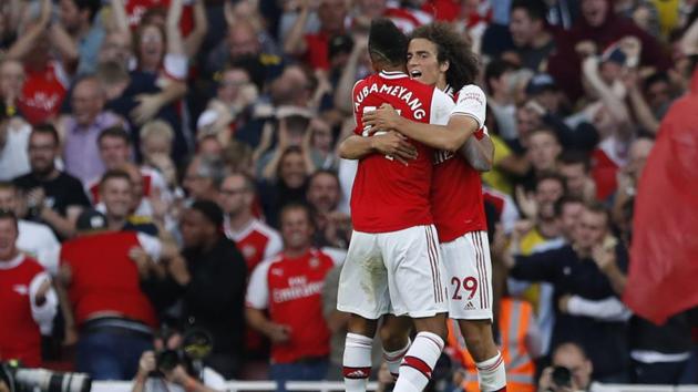Arsenal's Pierre-Emerick Aubameyang, left, celebrates with Arsenal's Matteo Guendouzi. (AP) Arsenal's Pierre-Emerick Aubameyang, left, celebrates with Arsenal's Matteo Guendouzi. (AP)