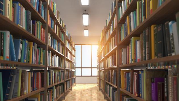 Bathed in sunlight that filters through its red curtains, the DLF-2 community library is a long hall with blue cabinets packed with books from across genres.(Representative Image/Getty Images/iStockphoto)