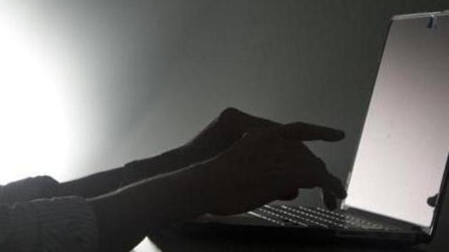 A man was allegedly duped of ₹19.3 lakh in a case of cyber fraud, while trying to help a woman, he befriended on social media. (AP File Photo) A man was allegedly duped of ₹19.3 lakh in a case of cyber fraud, while trying to help a woman, he befriended on social media. (AP File Photo)