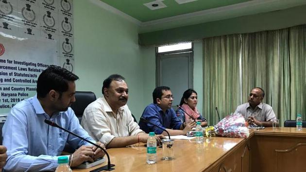 Officials of the department of town and country planning and Gurugram Police during a workshop at the Old CP Office. (Handout) Officials of the department of town and country planning and Gurugram Police during a workshop at the Old CP Office. (Handout)