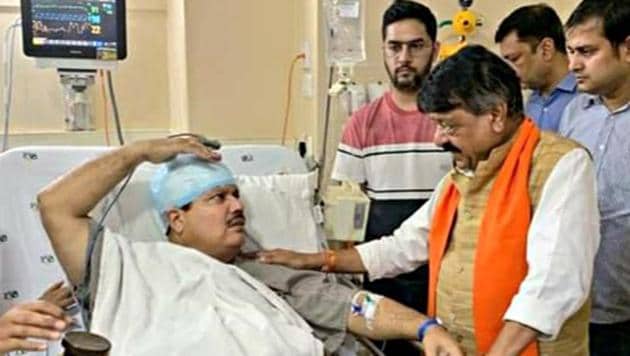 BJP National general secretary Kailash Vijayvargiya meets BJP Lok Sabha MP from Barrackpore Arjun Singh in hospital as he got injured during a protest against TMC in North 24 Parganas on Sunday. Arjun Singh alleged that he was attacked and his car was vandalised during the protest.