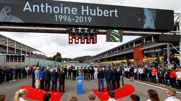 Formula One driver's, members of each team and staff observe a minute's silence ahead of the race in memory of Anthoine Hubert. (REUTERS)