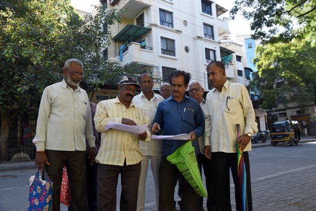 Former staff of Swastik Rubber Products Ltd at Range Hills in Khadki in Pune. About 420 former staff of the defunct firm have not received their PF dues since last 16 years. (HT PHOTO) Former staff of Swastik Rubber Products Ltd at Range Hills in Khadki in Pune. About 420 former staff of the defunct firm have not received their PF dues since last 16 years. (HT PHOTO)