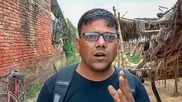 In this video still journalist Pawan Jaiswal, who had filmed students of a government school in eastern Uttar Pradesh's Mirzapur district eating rotis with salt as their mid-day meal, reiterates that he shot what he saw at the school in Mirzapur. Jaiswal has been booked for allegedly doing 'despicable work' of maligning the image of the Uttar Pradesh government by recording a video of school children being served salt and roti in midday meal.(PTI)