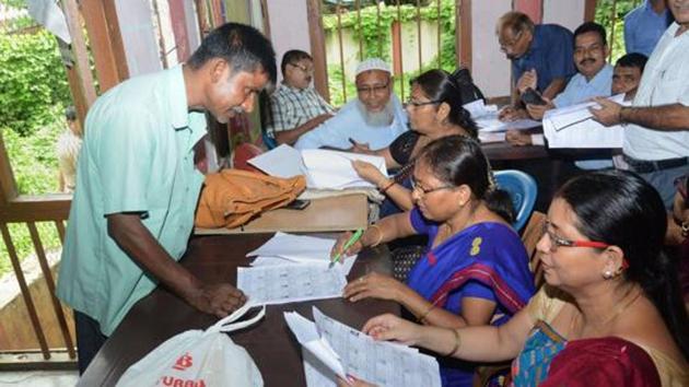 People check their names on the National Register of Citizens final list, Guwahati, Assam, August 31 (PTI) People check their names on the National Register of Citizens final list, Guwahati, Assam, August 31 (PTI)
