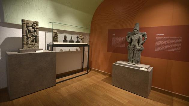 Artifacts on display in the gallery of confiscated and retrieved objects, inside the Purana Qila complex in New Delhi. The gallery, a first of its kind in the country, was inaugurated on Saturday by minister of state for culture Prahlad Singh Patel. It showcases various objects that have been recovered from art galleries across the world. A sculpture of Vishnu, the Hindu God who is considered the protector, can be seen on the right. (Biplov Bhuyan / HT Photo) Artifacts on display in the gallery of confiscated and retrieved objects, inside the Purana Qila complex in New Delhi. The gallery, a first of its kind in the country, was inaugurated on Saturday by minister of state for culture Prahlad Singh Patel. It showcases various objects that have been recovered from art galleries across the world. A sculpture of Vishnu, the Hindu God who is considered the protector, can be seen on the right. (Biplov Bhuyan / HT Photo)