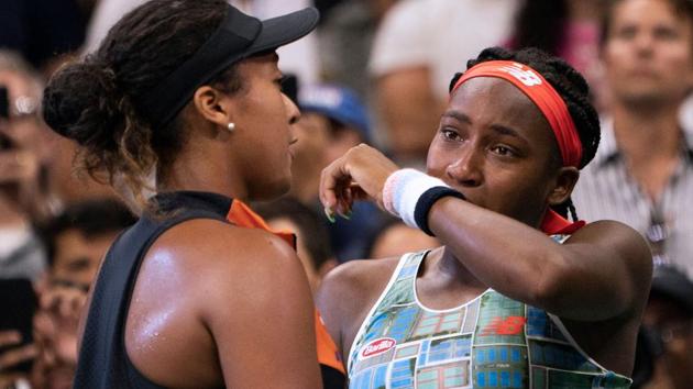 Naomi Osaka (L) of Japan comforts Coco Gauff of the US.(AFP) Naomi Osaka (L) of Japan comforts Coco Gauff of the US.(AFP)