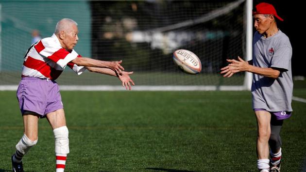 Ryuichi Nagayama (L), 86, Fuwaku Rugby Club’s oldest active player, participates in his team training in Tokyo. As a doctor, Nagayama is well aware of the risks involved in playing a high impact sport at his age. “You tackle and battle each other, but the gathering after the play is so enjoyable and fun,” said Nagayama. (Kim Kyung-Hoon / REUTERS) Ryuichi Nagayama (L), 86, Fuwaku Rugby Club’s oldest active player, participates in his team training in Tokyo. As a doctor, Nagayama is well aware of the risks involved in playing a high impact sport at his age. “You tackle and battle each other, but the gathering after the play is so enjoyable and fun,” said Nagayama. (Kim Kyung-Hoon / REUTERS)