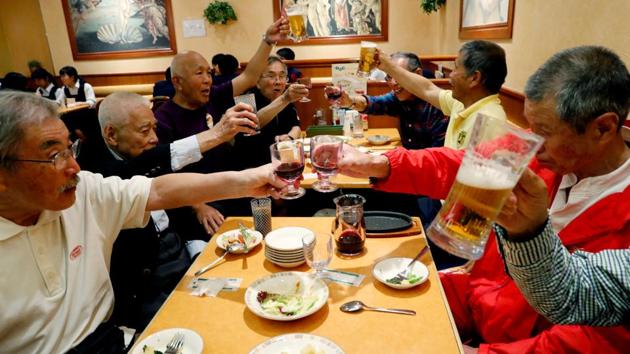 Fuwaku Rugby Club players have a drink at a restaurant after playing their match in Kumagaya, Saitama Prefecture. In a country where there is much concern over the loneliness of the elderly, rugby not only keeps the players active but also offers a ready-made social life. (Kim Kyung-Hoon / REUTERS) Fuwaku Rugby Club players have a drink at a restaurant after playing their match in Kumagaya, Saitama Prefecture. In a country where there is much concern over the loneliness of the elderly, rugby not only keeps the players active but also offers a ready-made social life. (Kim Kyung-Hoon / REUTERS)