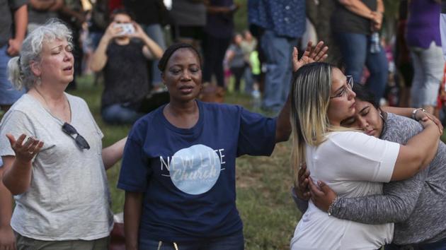 Odessa: Community members gather for a prayer vigil at the University of Texas Permian Basin in Odessa, Texas, Sunday, Sept. 1, 2019. AP/PTI(AP9_2_2019_000021B)(AP) Odessa: Community members gather for a prayer vigil at the University of Texas Permian Basin in Odessa, Texas, Sunday, Sept. 1, 2019. AP/PTI(AP9_2_2019_000021B)(AP)