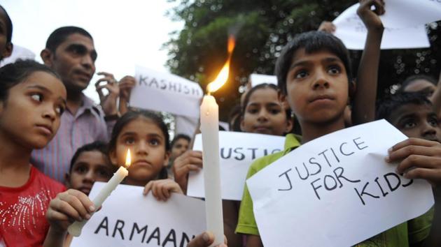 Children join a rally protesting against sexual crimes committed towards minors. In Gurugram, a 14-year old was sodomised by two men who also spiked his drink.(HT ARCHIVES)