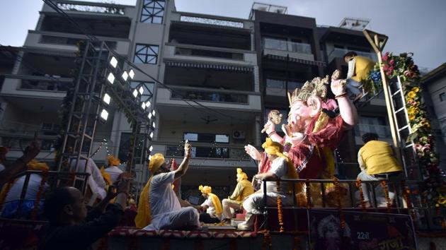 On the final day, the idols will be immersed in water (visarjan) to the chants of ‘Ganpati Bappa Morya, Pudhchya Varshi Lavkar Ya’, urging the deity’s return the following year as he departs from among devotees to his home to Mount Kailash. (Sonu Mehta / HT Photo) On the final day, the idols will be immersed in water (visarjan) to the chants of ‘Ganpati Bappa Morya, Pudhchya Varshi Lavkar Ya’, urging the deity’s return the following year as he departs from among devotees to his home to Mount Kailash. (Sonu Mehta / HT Photo)