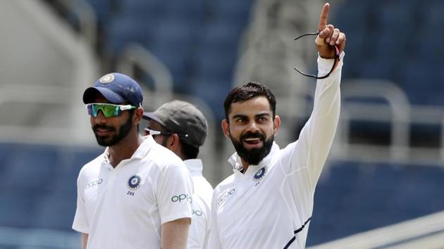 India's captain Virat Kohli celebrates running out West Indies' Shamarh Brooks. (AP) India's captain Virat Kohli celebrates running out West Indies' Shamarh Brooks. (AP)