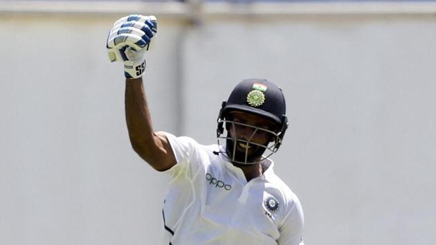India's Hanuma Vihari celebrates after he scored a century against West Indies.(AP)