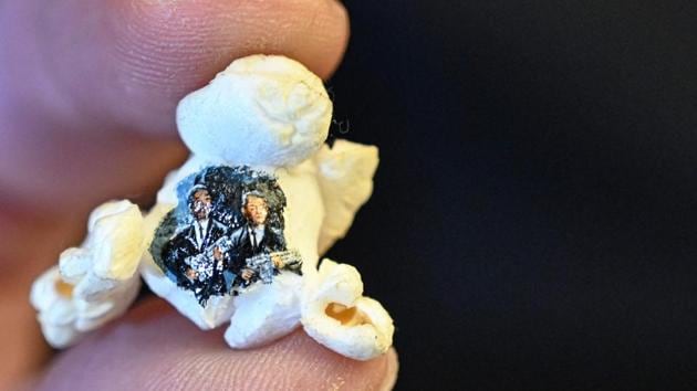 Some of his best-known pieces include a scene from the movie “Pulp Fiction” on the side of a piece of popcorn and the silhouette of Turkey’s founder Mustafa Kemal Ataturk on a grain of rice. (Ozan Kose / AFP)