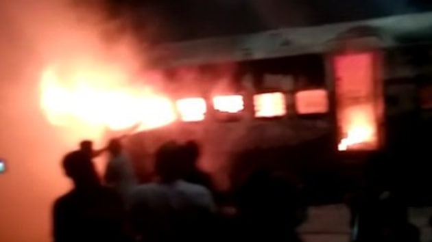 Flames could be seen raging in the compartment. (ANI photo) Flames could be seen raging in the compartment. (ANI photo)