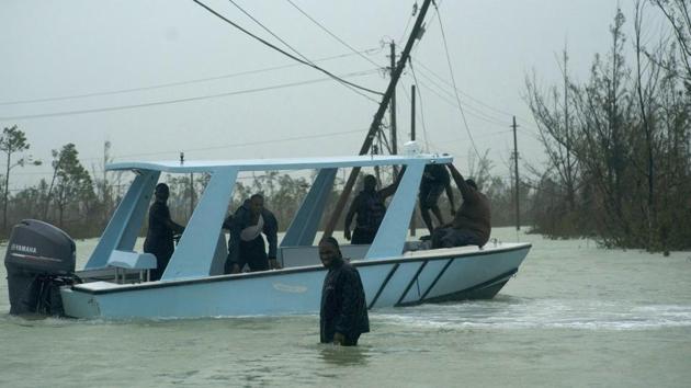 Volunteers depart on a motor-boat to rescue people trapped by the rising waters of Hurricane Dorian, on a flooded road near the Causarina bridge in Freeport, Grand Bahama, Bahamas, on Tuesday. (AP File Photo) Volunteers depart on a motor-boat to rescue people trapped by the rising waters of Hurricane Dorian, on a flooded road near the Causarina bridge in Freeport, Grand Bahama, Bahamas, on Tuesday. (AP File Photo)