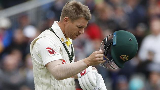 Australia's David Warner leaves the field after being dismissed.(AP)