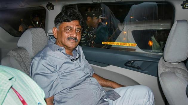 Karnataka Congress leader D K Shivakumar leaves after being produced at Rouse Avenue Court in New Delhi, Wednesday. (Photo: PTI) Karnataka Congress leader D K Shivakumar leaves after being produced at Rouse Avenue Court in New Delhi, Wednesday. (Photo: PTI)
