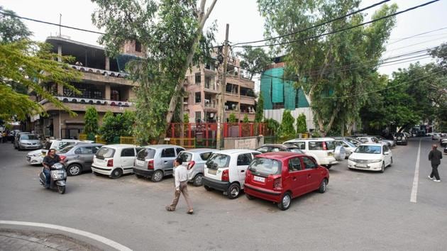 Cars parked in a residential parking area at C-block in Lajpat Nagar-2, New Delhi on Tuesday. (HT File Photo) Cars parked in a residential parking area at C-block in Lajpat Nagar-2, New Delhi on Tuesday. (HT File Photo)